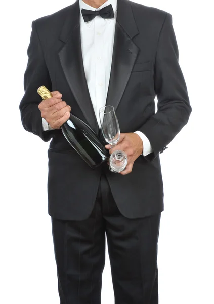 Людина в смокінгу з шампанським — стокове фото