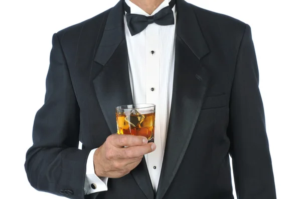 Homem em Tuxedo Segurando Cocktail — Fotografia de Stock