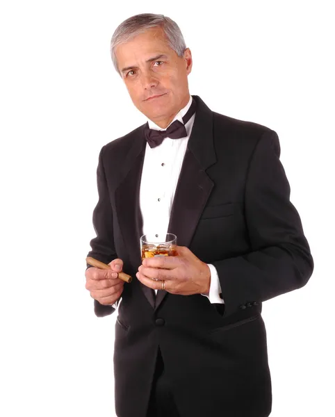 Mann in Tux mit Getränk — Stockfoto