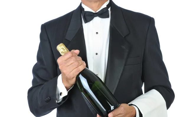 Sommelier holding şişe şampanya — Stok fotoğraf
