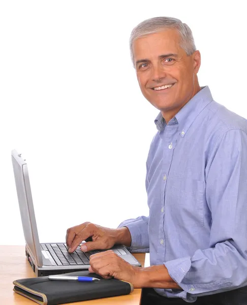 Biznesmen siedząca przy komputerze — Zdjęcie stockowe