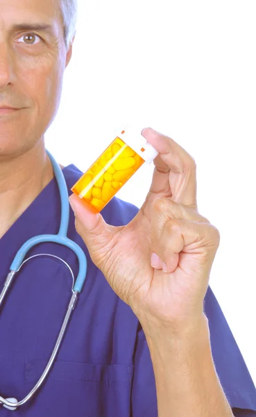 Doctor holding prescription bottle — Stock Photo, Image