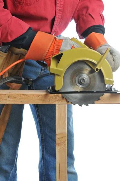 Trabajador de la construcción con sierra circular — Foto de Stock