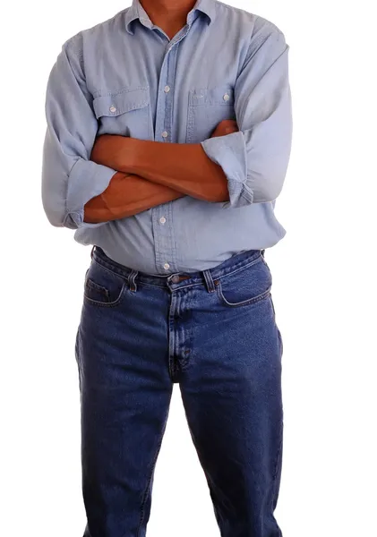 Мужчина в джинсах и рабочей рубашке — стоковое фото