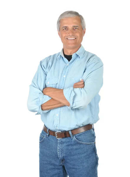 Улыбающийся человек в джинсах и рабочей рубашке — стоковое фото