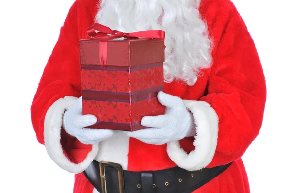 Santa Claus sosteniendo presente —  Fotos de Stock