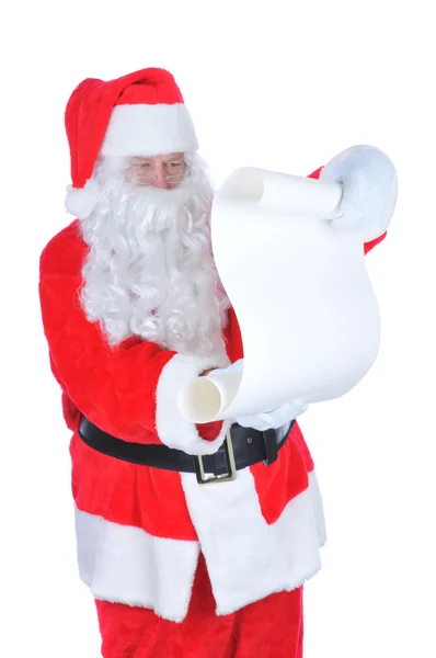 Papai Noel com uma lista impertinente em branco — Fotografia de Stock