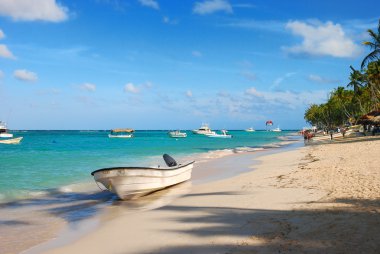 Exotic Beach boat in Dominican Republic clipart