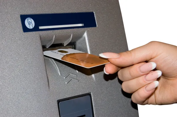 Vrouwelijke hand voegt bancaire kaart — Stockfoto