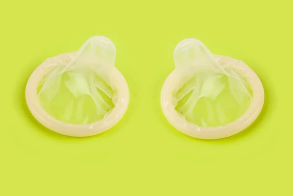 Yellow condoms — Stock Photo, Image