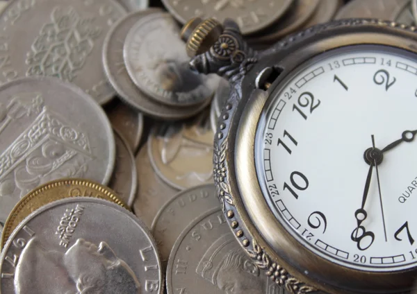 Tiempo y dinero Imagen de stock