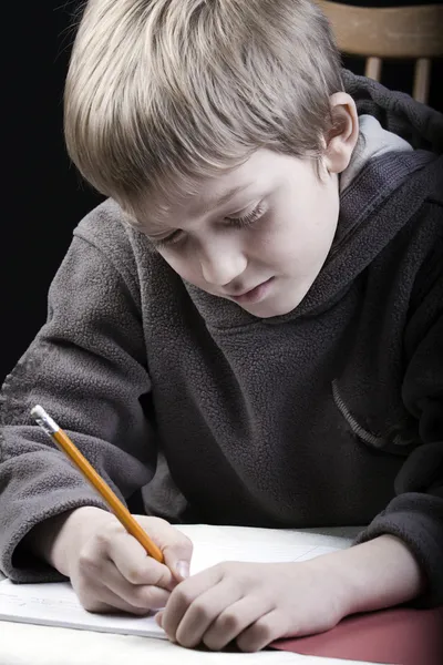 stock image Young boy studying