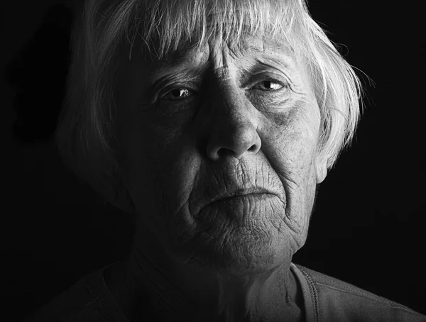 An aged and distressed lady — Stock Photo, Image