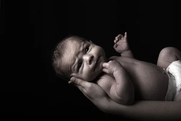 Low key portrat of a new baby — Stock Photo, Image