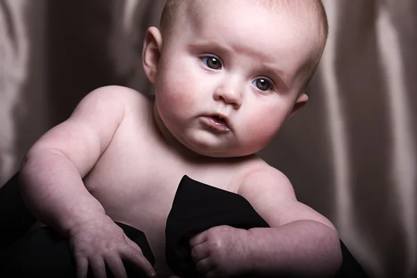 Low key portrat of a five month old baby — Stock Photo, Image