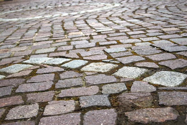 Medieval cobblestone paving texture — Stock Photo, Image