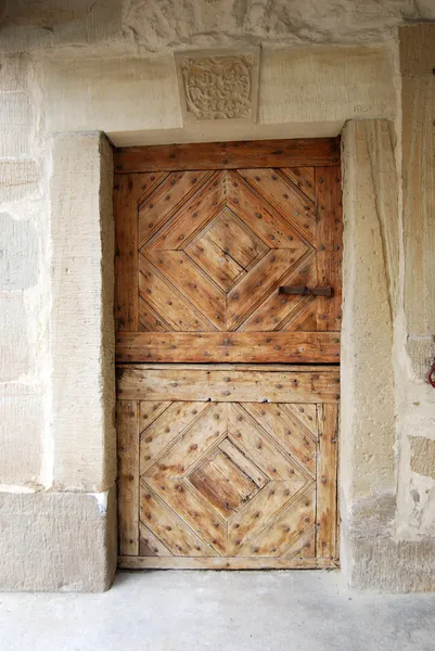 Old wooden fortress door — Stock Photo, Image
