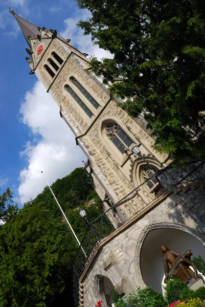 Liechtenstein church and statue — Stock Photo, Image