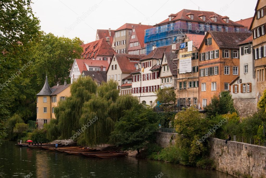 Neckar river with boats and Tübingen