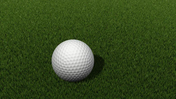 Golfball на траві — стокове фото