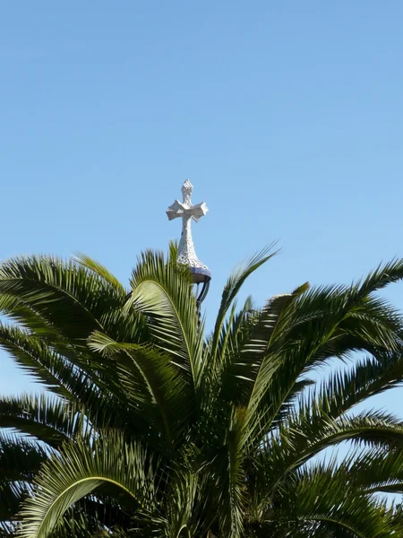 Palm and crucifix — Stockfoto