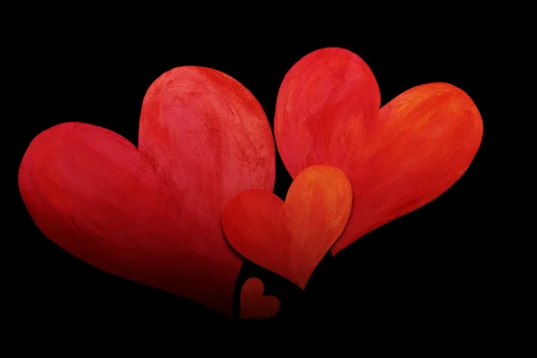 Rote Herzen auf schwarz — Stockfoto