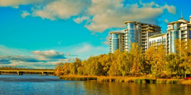 Building on the coast of river in Kiev clipart