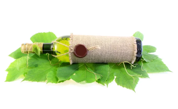 stock image Wine on grapes leaves