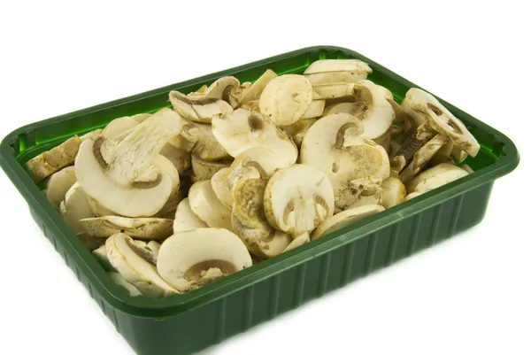 Pokrojone w plasterki grzyby champignon — Zdjęcie stockowe