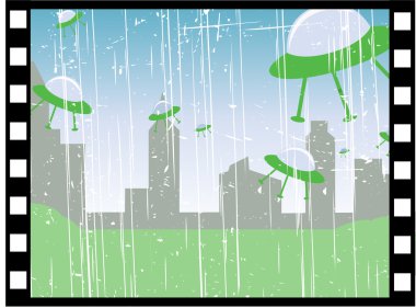 Film strip of ufos flying over city land clipart