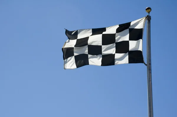 Finishlijn geruite vlag op pole-position — Stockfoto