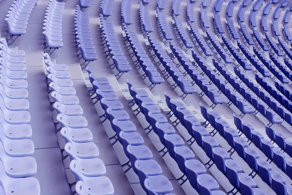 Several rows of blue plastic stadium sea — Stock Photo, Image