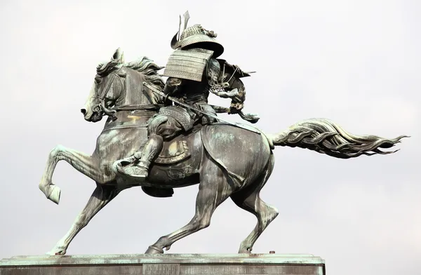 Kusunoki Masashiges staty utanför imperi Stockfoto