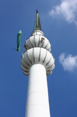 Minaret with green flag clipart