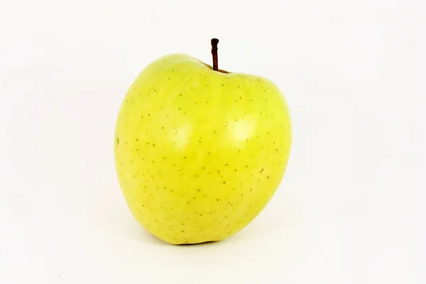 Витерти свіже жовте яблуко — стокове фото