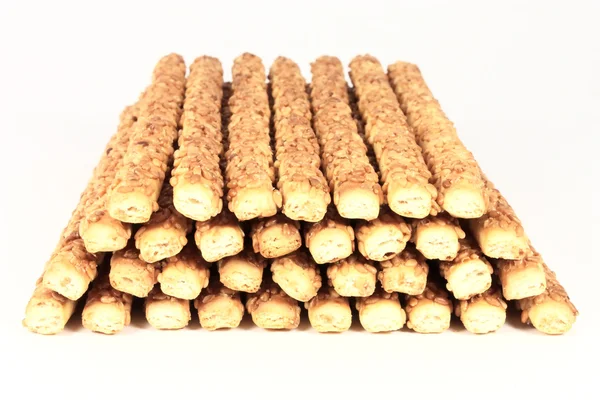 Breadstick dengan latar belakang biji wijen — Stok Foto