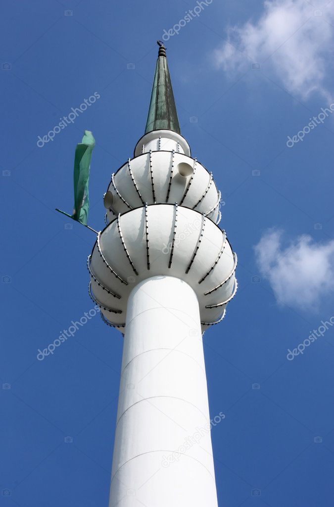 Minaret with green flag