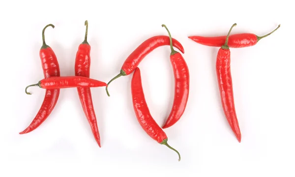Papriky text "horké" — Stock fotografie