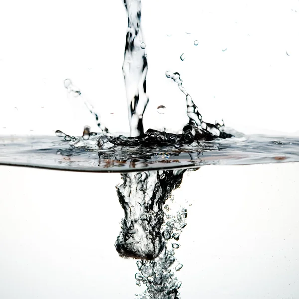 Chispas de agua sobre fondo blanco —  Fotos de Stock