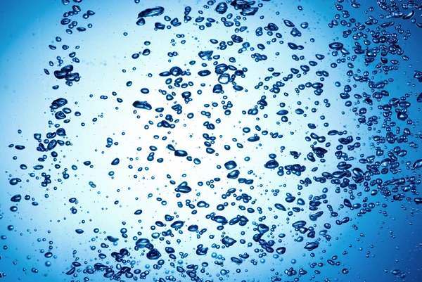 Бульбашки в чистій воді Ліцензійні Стокові Фото