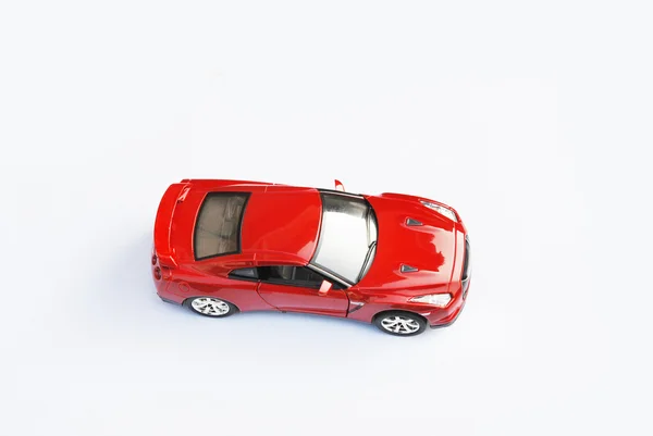 Carro vermelho isolado no fundo branco — Fotografia de Stock
