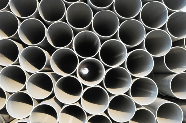 Круглые стальные трубы различных размеров и калибра свайного фона . — стоковое фото