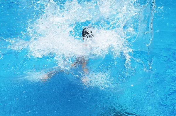 stock image Boy playing in swiming pool