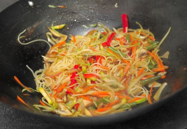 Preparation of Thai noodles vok clipart