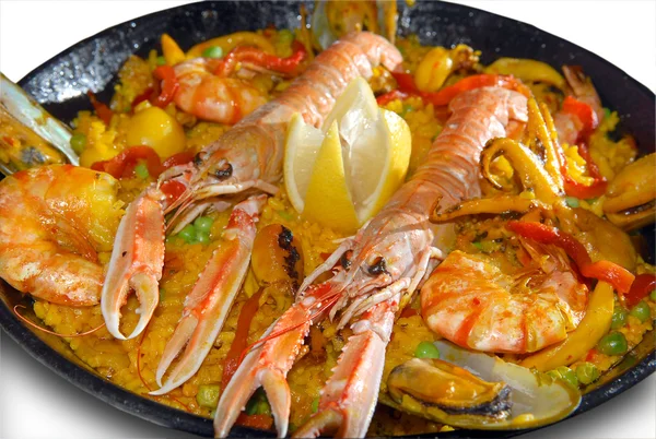 stock image Paella with seafood in a frying pan