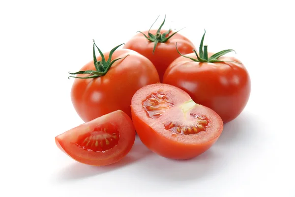 Czerwone pomidory i pół — Zdjęcie stockowe