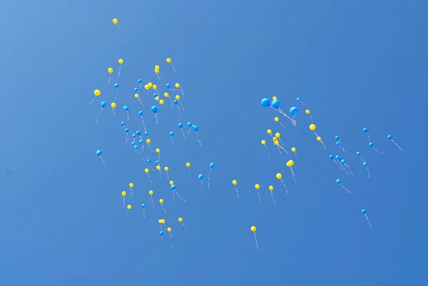 Stock image Blue and yellow balloons