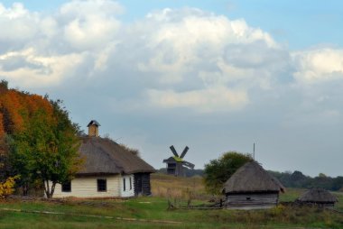 Rural landscape with a mill clipart