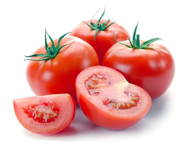 Tomates rojos y la mitad — Foto de Stock