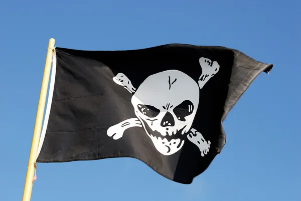Pirate i - jolly roger vlag — Stockfoto